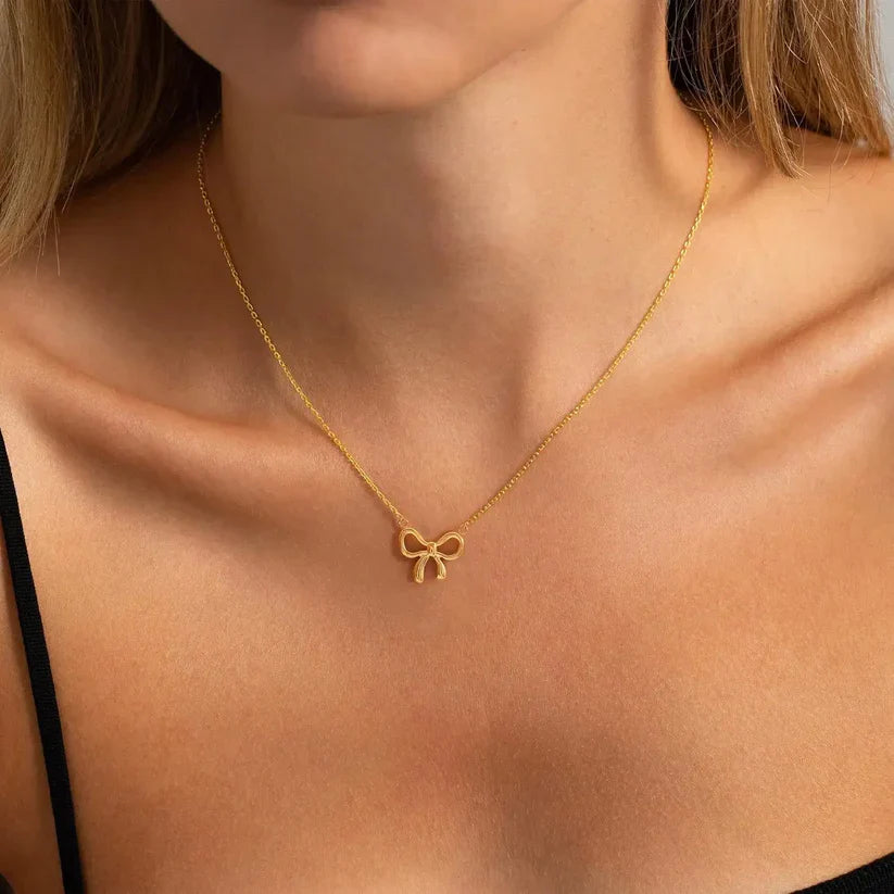 Elegant Bow Pendant Necklace..